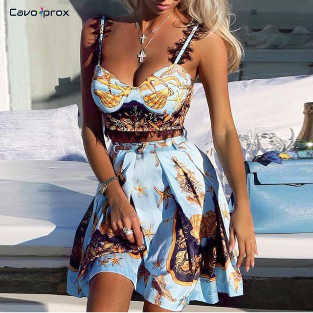 Mujeres Conjuntos de dos piezas Encaje Insertar Imprimir Cami Top y plisado por encima de la rodilla Mini conjunto de falda Plunge escote en V Sin espalda corte Conjuntos sexy